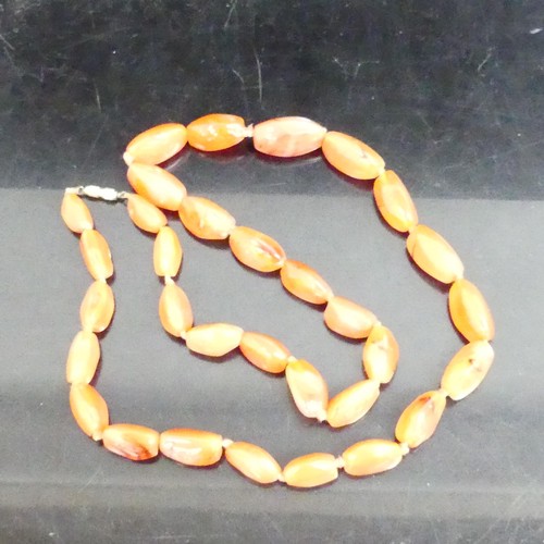 994 - A cherry Bakelite bead necklace, a carnelian bead necklace, and other Bakelite necklace etc