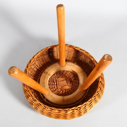 439 - A Tony Paul 1960s' wickers stool / ottoman on beech tripod frame, height 43cm, diameter 45cm