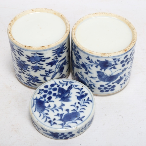 133 - A pair of Chinese blue and white porcelain cylindrical pots, with painted birds (1 lid missing), hei... 