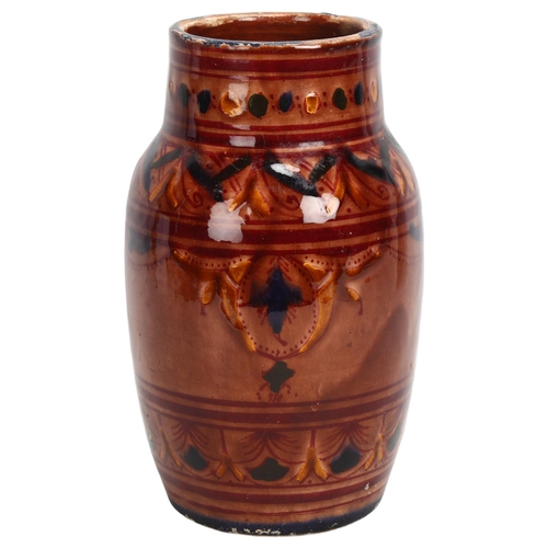 135 - A Moroccan Safi pottery vase with painted decoration, height 21cm