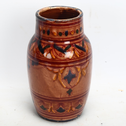 135 - A Moroccan Safi pottery vase with painted decoration, height 21cm