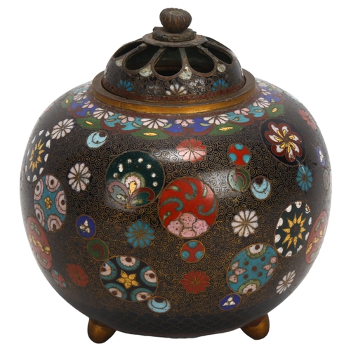 143 - A fine Japanese cloisonne enamel pot pourri jar and cover, decorated with circular discs, height 13c... 