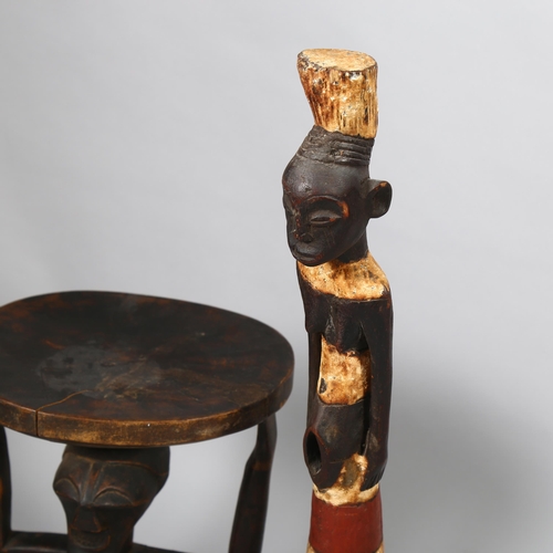 152 - Congo African Tribal carved wood stool, supported by a figure, height 42cm, and a carved and painted... 