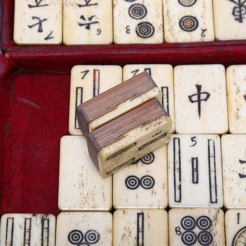 157 - A Chinese Mahjong set, bone and bamboo, in original leather case