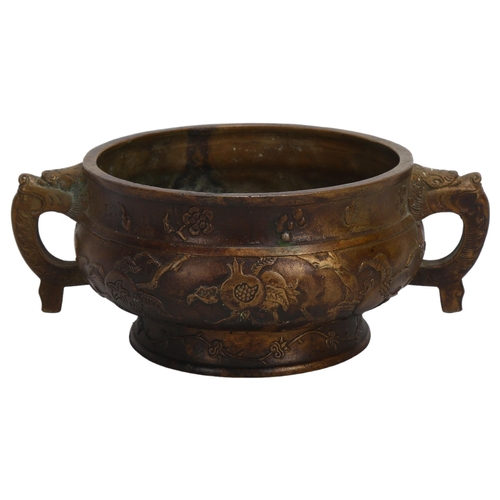 159 - A Chinese relief cast bronze 2-handled incense burner, rim diameter 12.5cm, height 7cm, 6 character ... 