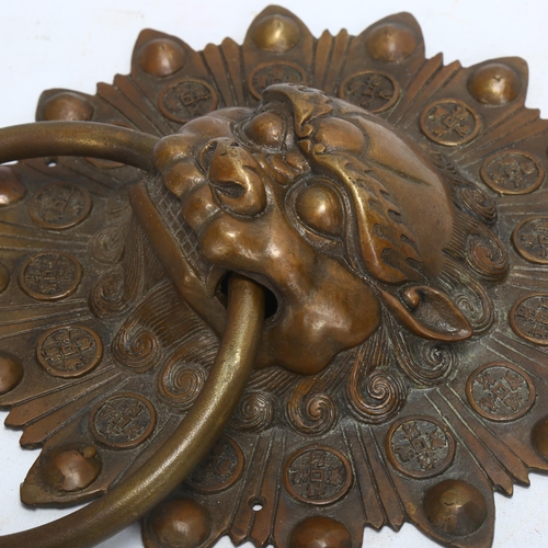 161 - A Chinese dog of fo design brass door knocker, height 26cm