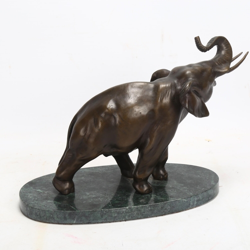 163 - A patinated bronze elephant sculpture, on green marble base, base length 27cm