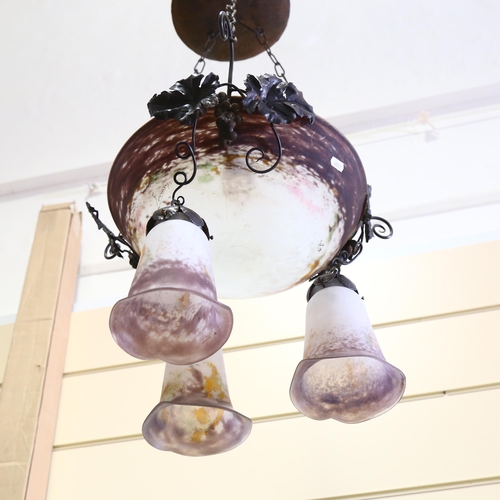 165 - A French wrought-iron and coloured glass hanging light fitting, with central bowl and 3 pendant ligh... 