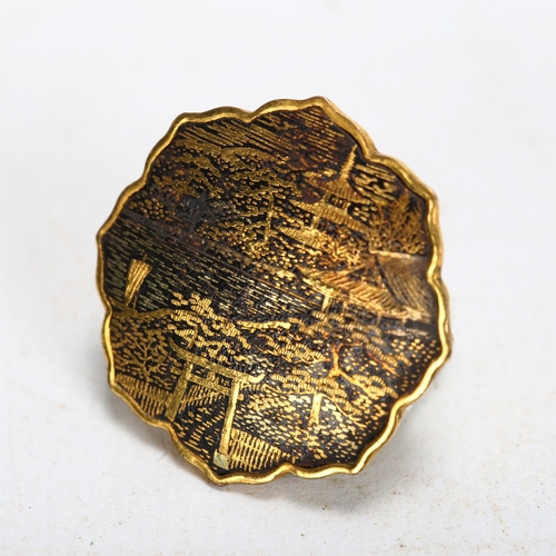 172 - O Komai, small Japanese inlaid metal brooch, diameter 2.5cm