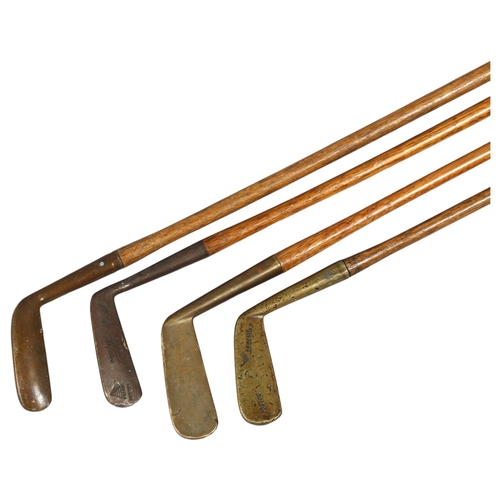 188 - 4 Antique wood-shafted brass golf putters