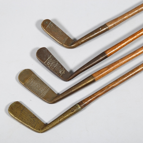 188 - 4 Antique wood-shafted brass golf putters