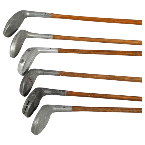 189 - A group of 6 Vintage wood-shafted aluminium golf clubs