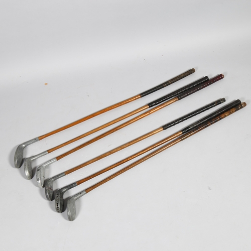 189 - A group of 6 Vintage wood-shafted aluminium golf clubs