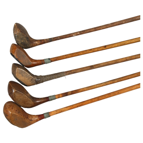 191 - A group of 5 wood-shafted golf drivers