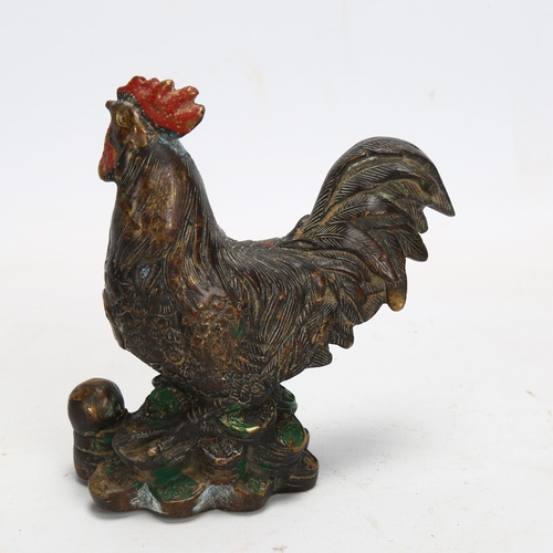 201 - A Chinese patinated and painted brass cockerel, height 11.5cm