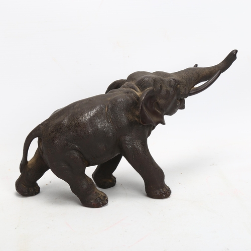 40 - Japanese Meiji Period patinated bronze bull elephant, late 19th century, unsigned, length 32cm