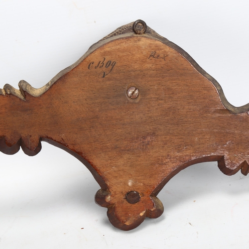 41 - 19th century Black Forest carved wood wall-hanging coat rack, with dog's head mount, width 40cm