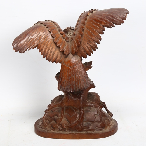 44 - 19th century Black Forest sculpture, depicting an eagle with dead ibex, height 26cm