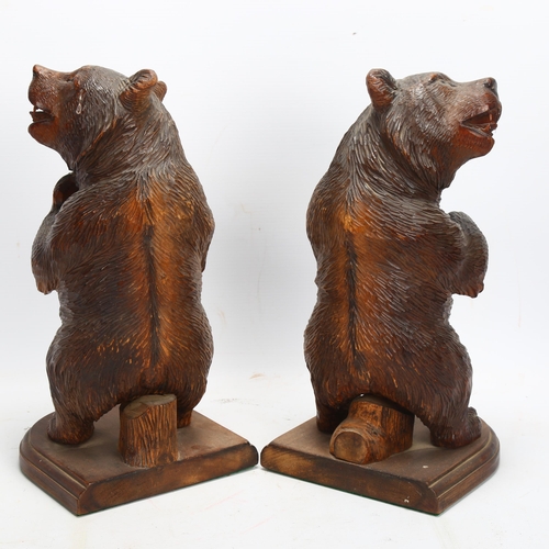 46 - A pair of 19th century Black Forest carved and stained wood standing bears, height 30cm