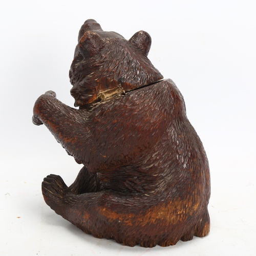 49 - 19th century Black Forest carved and stained wood bear design box, with hinged head, height 22cm