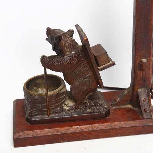 50 - A Black Forest table lamp with carved wood bear mount, and a small Black Forest seated bear ornament... 