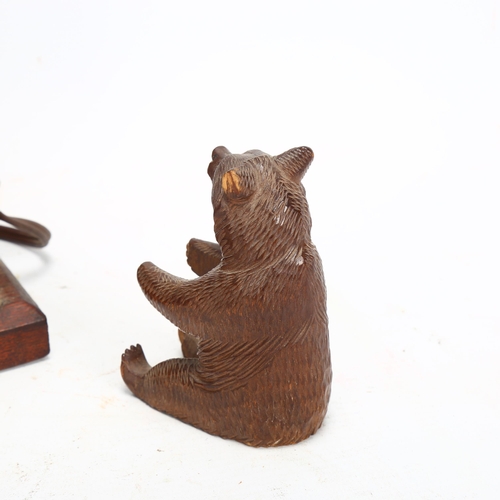 50 - A Black Forest table lamp with carved wood bear mount, and a small Black Forest seated bear ornament... 