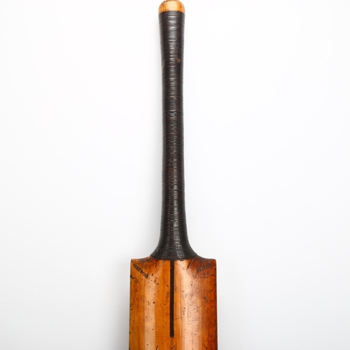 51 - A mid-19th century cricket bat by Aquila Clapshaw Son & Company, with presentation plaque on the end... 