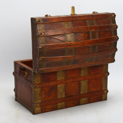 55 - A miniature brass-bound stained wood dome-top novelty box, in the form of a travelling trunk, length... 