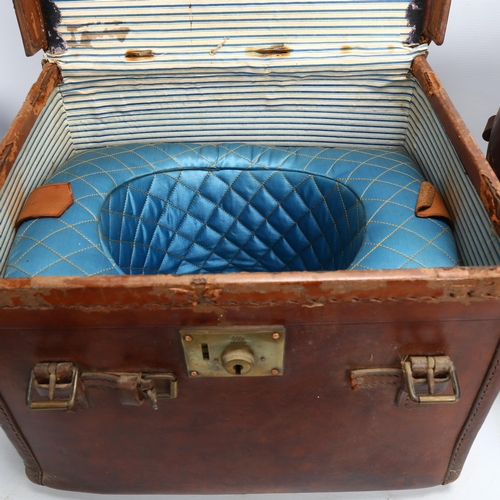 59 - 2 Victorian leather hat boxes, each containing a bowler hat