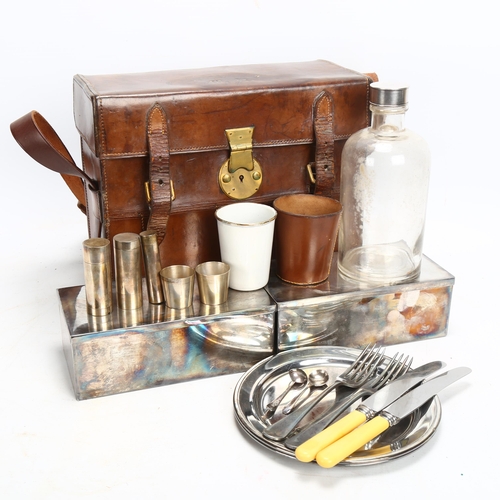 63 - A Victorian leather picnic set, by Thornhill & Co New Bond Street London, containing electroplate bo... 