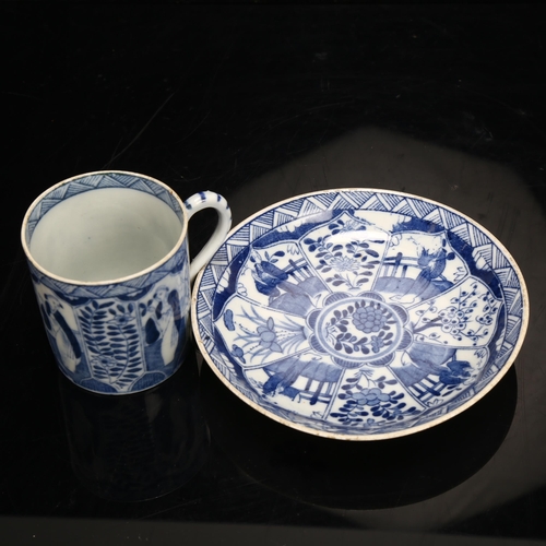 67 - A Chinese blue and white porcelain teacup and saucer on wood stand, saucer diameter 12.5cm