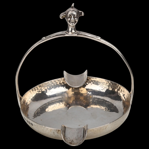 1434 - An Arts and Crafts George V silver 'Jester' ashtray, Elkington & Co Ltd, Birmingham 1910, planished ... 