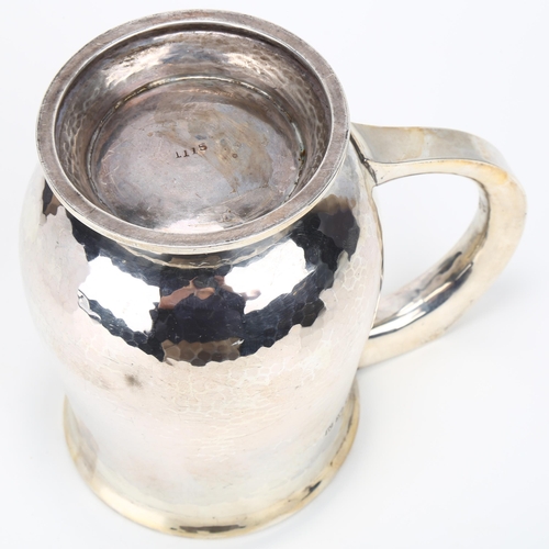 1436 - An Edward VIII silver pint mug, Albert Edward Jones, Birmingham 1936, baluster form with planished d... 