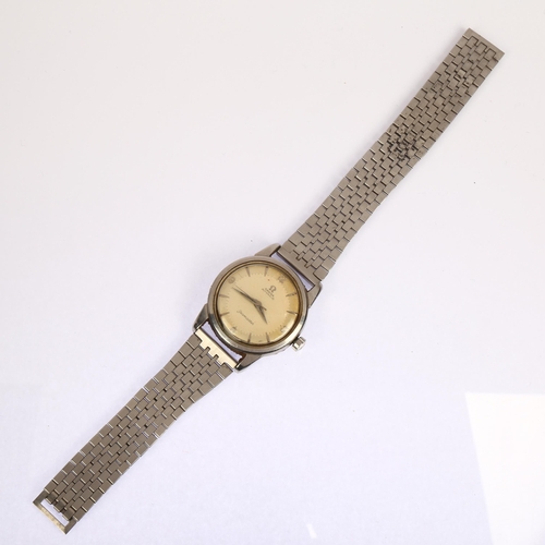 1014 - OMEGA - a stainless steel Seamaster automatic wristwatch, circa 1958, silvered dial with quarterly a... 