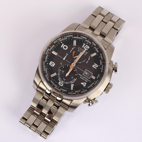 1015 - CITIZEN - a stainless steel Eco-Drive Radio Controlled World Time Solar quartz bracelet watch, ref. ... 