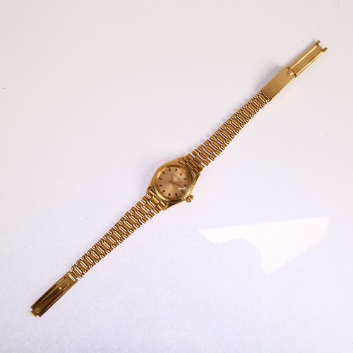 1024 - ROLEX - a lady's 18ct gold Oyster Perpetual automatic bracelet watch, ref. 6617, champagne dial with... 