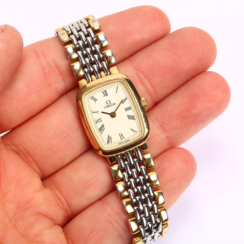 1025 - OMEGA - a lady's gold plated stainless steel De Ville quartz bracelet watch, cream dial with Roman n... 