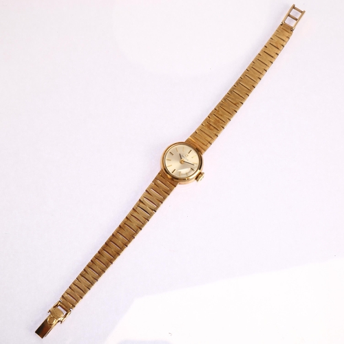 1027 - OMEGA - a lady's 9ct gold mechanical bracelet watch, circa 1966, silvered dial with applied gilt bat... 