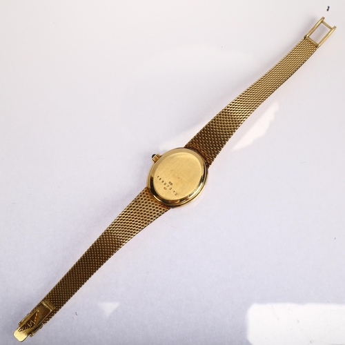 1028 - LONGINES - a lady's 14ct gold quartz bracelet watch, circa 1980s, champagne dial with applied gilt b... 