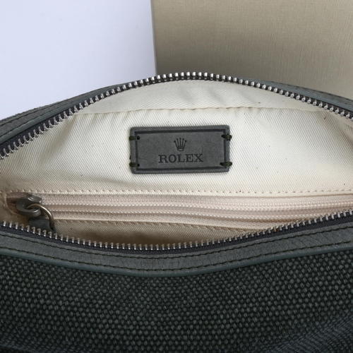 1037 - ROLEX - a green leather and woven cotton toiletry/washbag, width 24cm, boxed