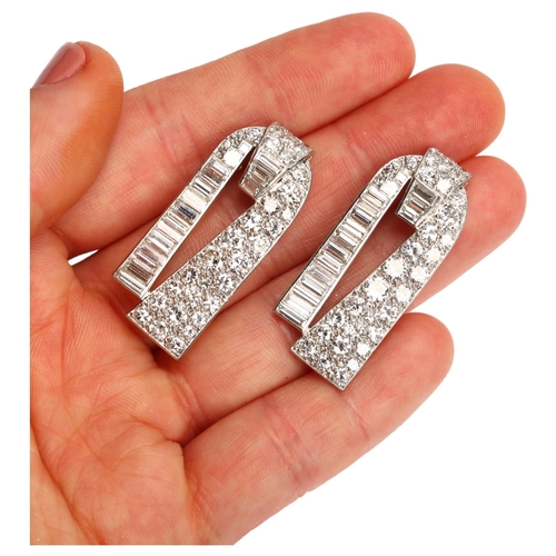 1103 - CARTIER - a pair of Art Deco platinum diamond dress clips, circa 1930s, geometric form, each set wit... 