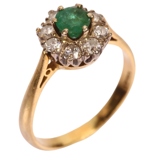 1108 - A late 20th century 18ct gold emerald and diamond flowerhead cluster ring, set with round-cut emeral... 