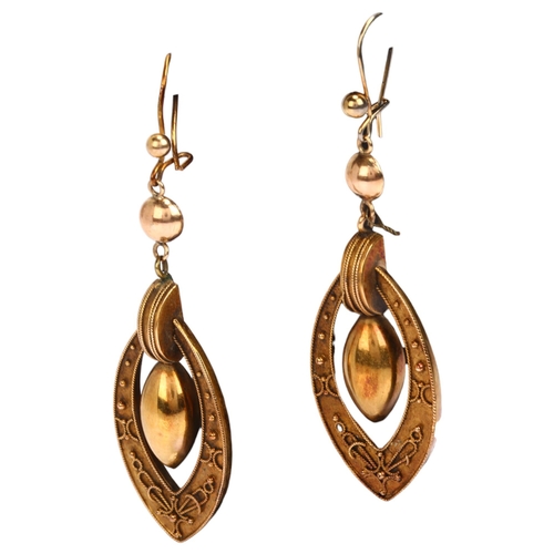 1113 - A pair of Victorian Etruscan Revival drop earrings, unmarked gold closed-back settings with rope twi... 