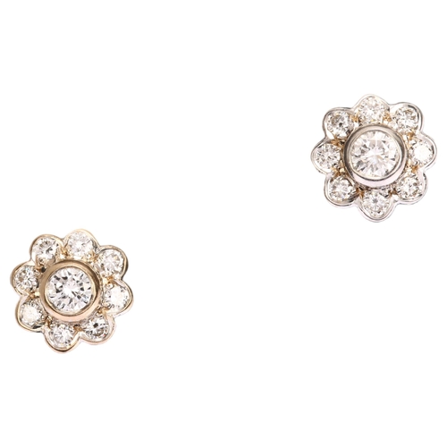 1119 - A pair of diamond flowerhead cluster earrings, unmarked 18ct white gold settings with modern round b... 