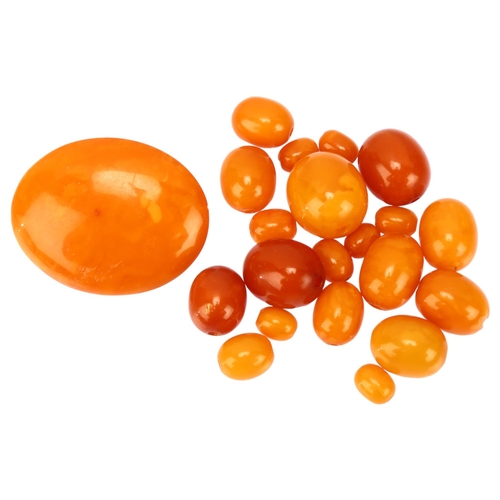 1128 - A group of loose graduated butterscotch amber beads, bead lengths 21.1 - 9.5mm, and an oval amber br... 