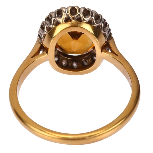 1131 - An 18ct gold citrine and diamond oval cluster ring, platinum-topped with oval mixed-cut citrine and ... 