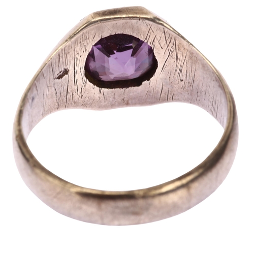 1139 - A solitaire synthetic sapphire signet ring, heavy unmarked white metal settings with cushion-cut sap... 