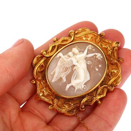 1141 - A Victorian shell cameo brooch, relief carved depicting Venus and Cupid, unmarked, engraved yellow m... 