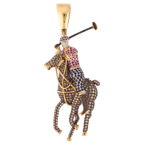 1150 - A large modern 9ct gold sapphire ruby and diamond 3-dimensional polo player pendant, pave set with r... 