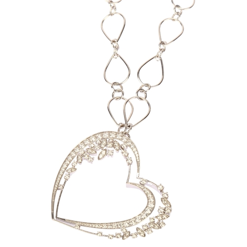 1153 - A large modern diamond openwork heart pendant necklace, unmarked 18ct white gold settings, with grad... 